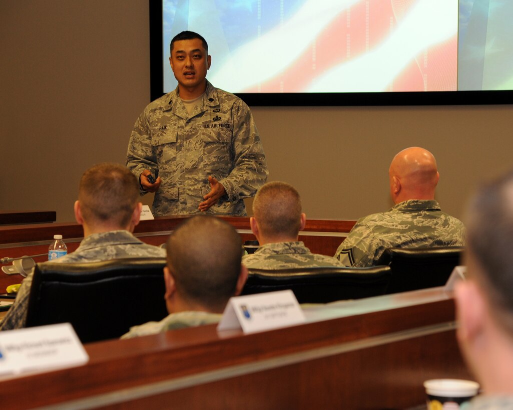 Lt. Col. Seung Paik, chief of budget operations for Air Force Global Strike Command, speaks during the Chief Orientation Course at Barksdale Air Force Base, La., Jan. 29. During his briefing, Paik explained how economic principles apply to leadership decisions. (U.S. Air Force photo/ Airman 1st Class Jannelle Dickey)