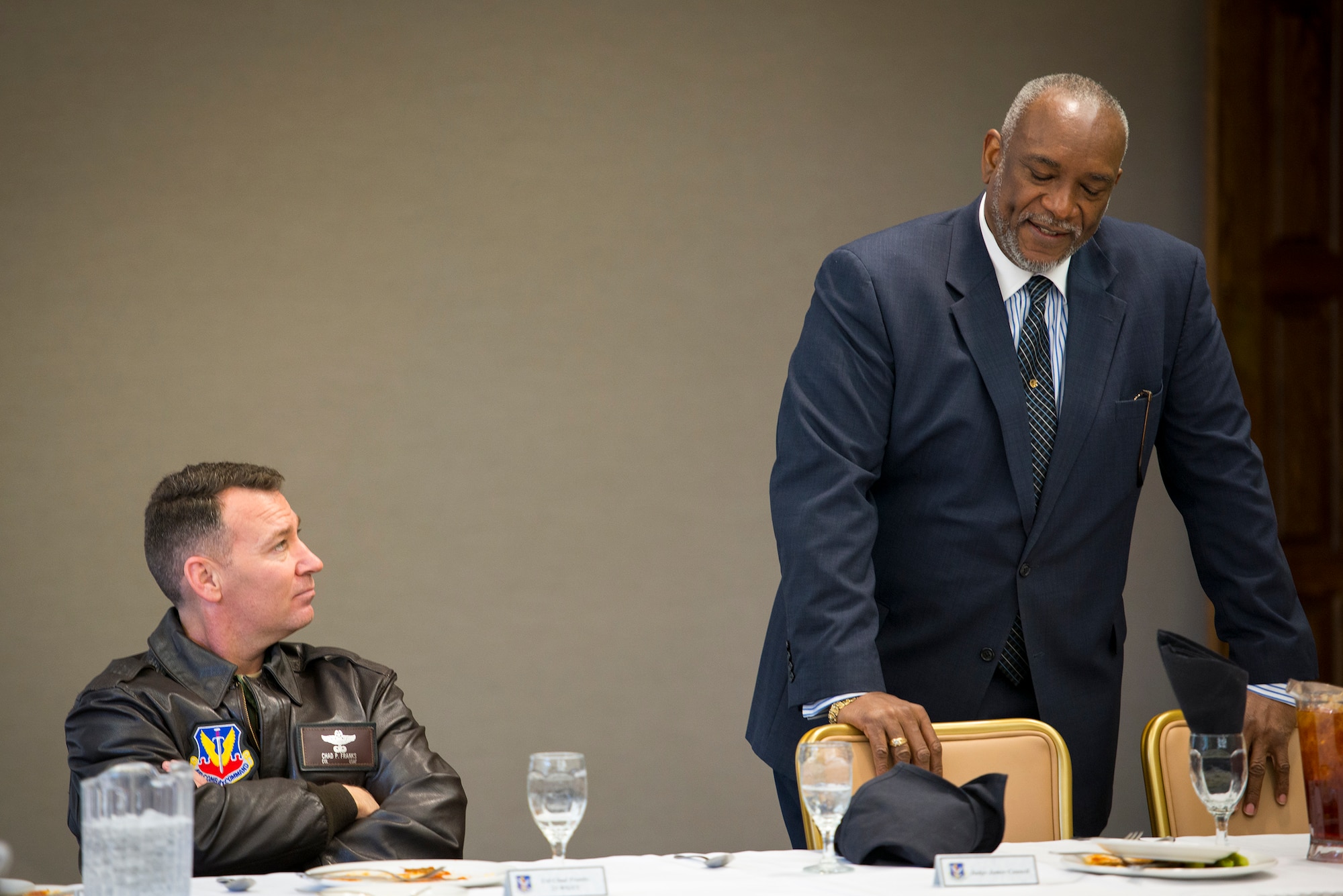 U.S. Air Force Col. Chad Franks, left, 23d Wing commander, listens to the Honorable James F. Council Jr., Judge of the Juvenile Court of Lowndes County, during a Lunch and Learn seminar at Moody Air Force Base, Ga., Jan. 30, 2014. Council has practiced criminal and civil law in the Superior, State, Probate, Magistrate, and Juvenile Courts of Georgia and U.S. District Court for more than 34 years. (U.S. Air Force photo by Airman 1st Class Ryan Callaghan/Released)
