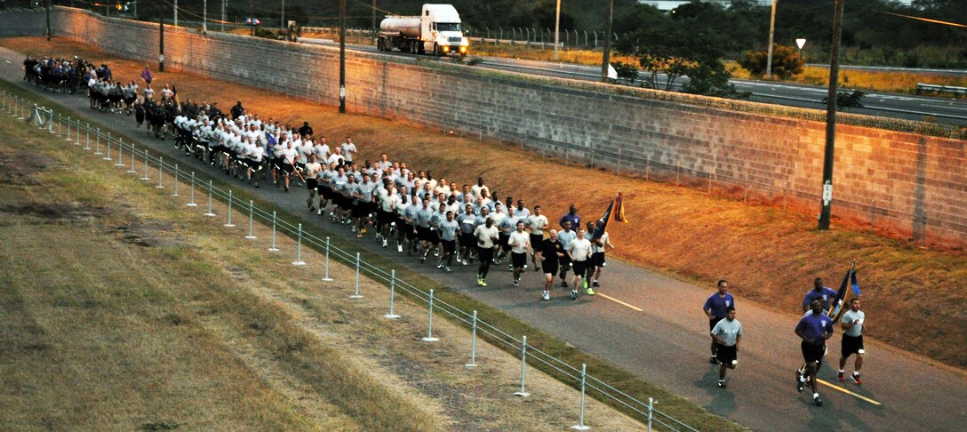 Joint Task Force-Bravo Command Sgt. Maj. Valmond A. Martin leads the way during a formation run conducted in his honor at Soto Cano Air Base, Honduras, Jan. 31, 2014. Martin, who enlisted in the U.S. Army in 1983, is retiring after more than 31 years of service. The event marked the final formation run of the Command Sergeant Major’s career. (U.S. Air Force photo by Capt. Zach Anderson) 