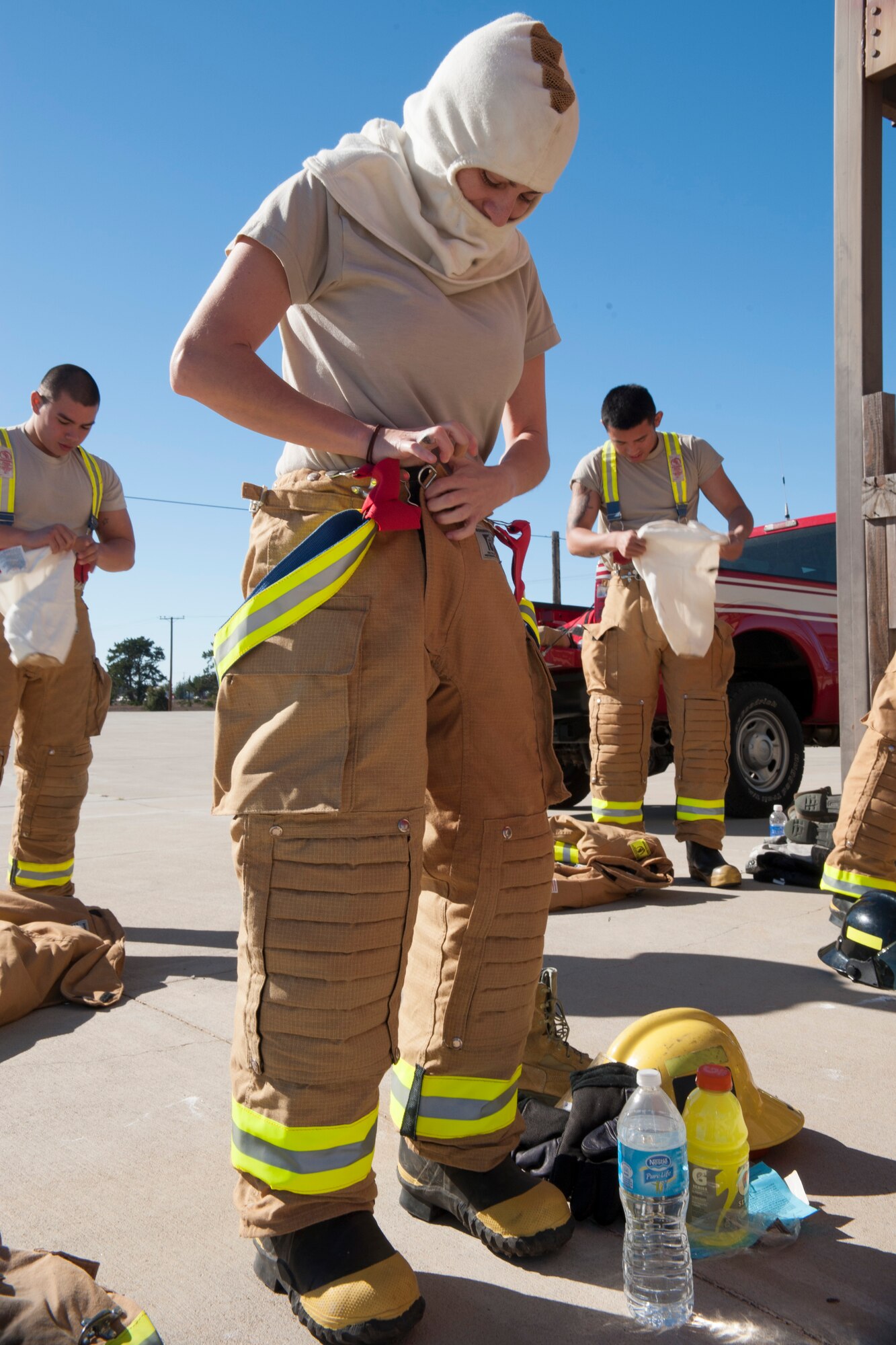 VANDENBERG AIR FORCE BASE, Calif. – Senior Airman Natalie Bernal, 30th Contracting Squadron contract specialist, prepares to enter a simulated burning building here Jan. 29. Col. Keith Balts, 30th Space Wing commander, along with Airmen of the quarter winners, got the opportunity to work with the Vandenberg Firefighters during a burning building exercise. (U.S. Air Force photo/Airman 1st Class Yvonne Morales)
