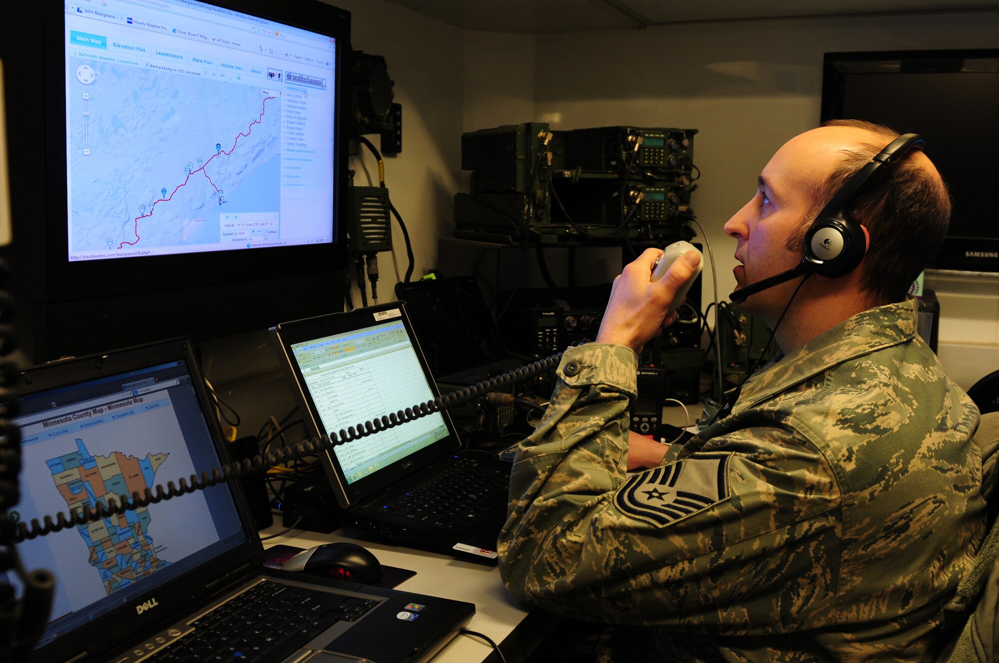 U.S. Air Force Master Sgt. Bryan Druar, Non-Commissioned Officer In Charge (NCOIC) of the Deployable Interoperable Communications Element (DICE), 148th Fighter Wing, Duluth, Minn. sets up and tests communication equipment at a remote location northwest of Grand Marais, Minn., Jan. 28, 2014.  Master Sgt. Druar and his team were at the remote location to provide communication support for the John Beargrease sled dog marathon.  (U. S. Air National Guard photo by Master Sgt. Ralph J. Kapustka/Released)  