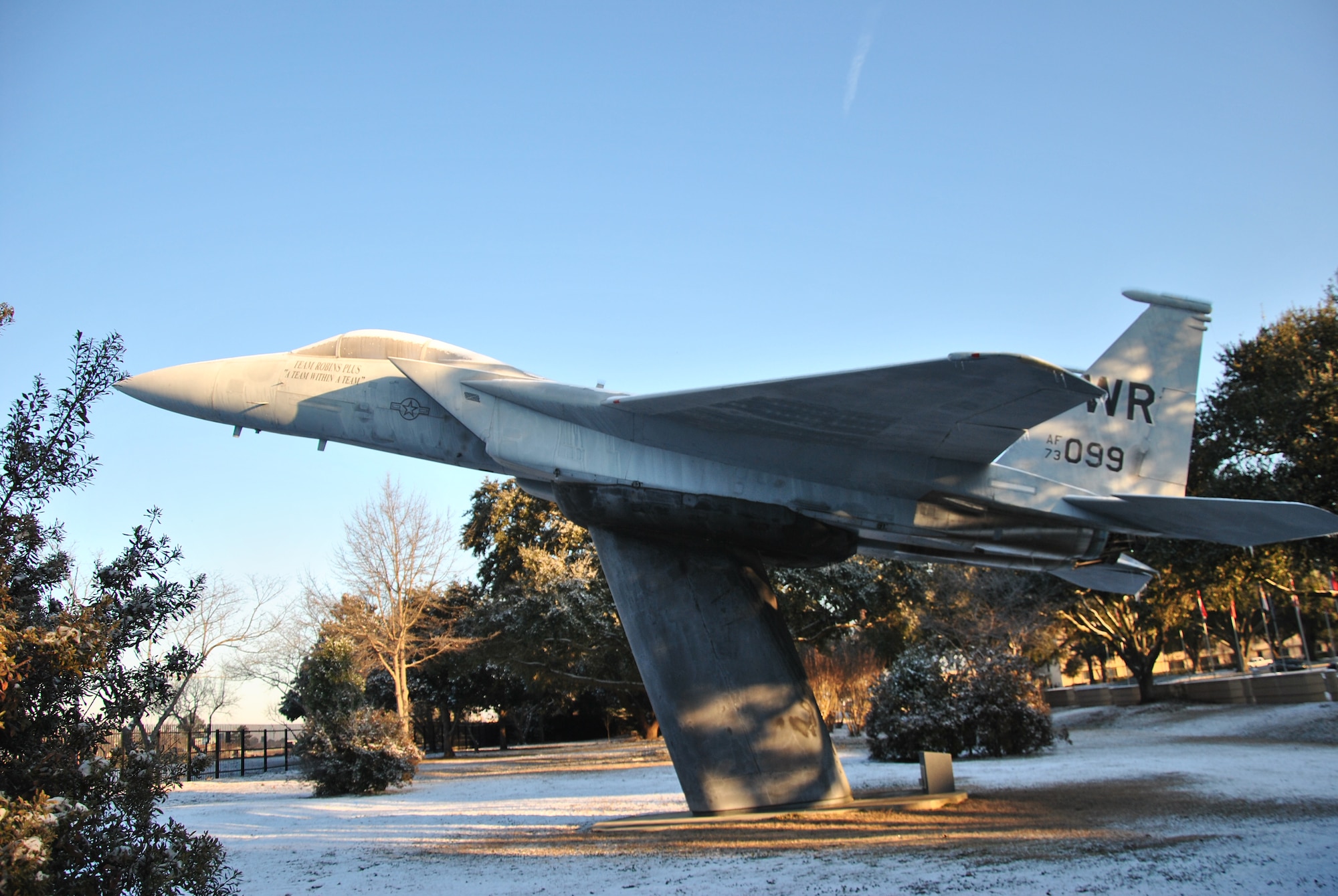 The F-15 display in front of Bldg. 215 near the main gate was still covered in a sheet of ice Thursday when employees returned to work. (U.S. Air Force photo by Ray Crayton)
