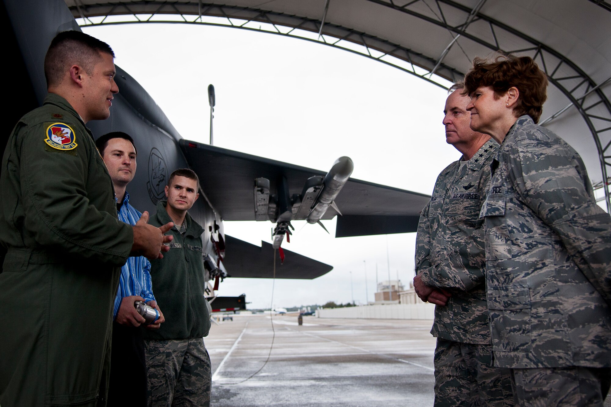 Maj. Ryan Sanford, an F-15 pilot, briefs Air Force Chief of Staff Gen. Mark A. Welsh III and Gen. Janet Wolfenbarger, Air Force Materiel Command commander, about the mission of the 40th Flight Test Squadron at Eglin Air Force Base, Fla., Jan. 27.  The generals received the brief as part of a developmental and operation test orientation to the 96th Test Wing and the 53rd Wing.  (U.S. Air Force photo/Samuel King Jr.)