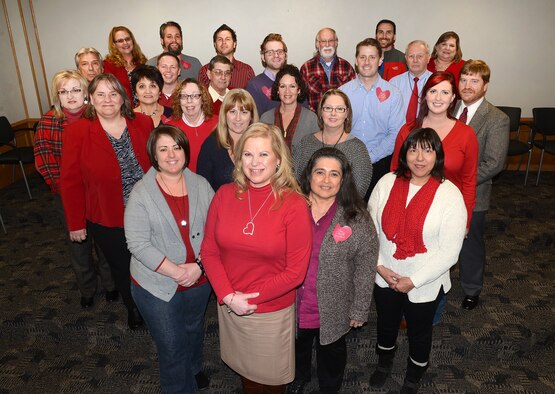 Sherri Sutterfield, a Contract Field Team Program manager, front, is happy to have the support of her co-workers in the Air Force Sustainment Center Contracting Directorate. Ms. Sutterfield has heart disease and now promotes heart health to anyone who will listen. She’s a testament to getting checked by a physician and having a heart scan. Her scan saved her life.