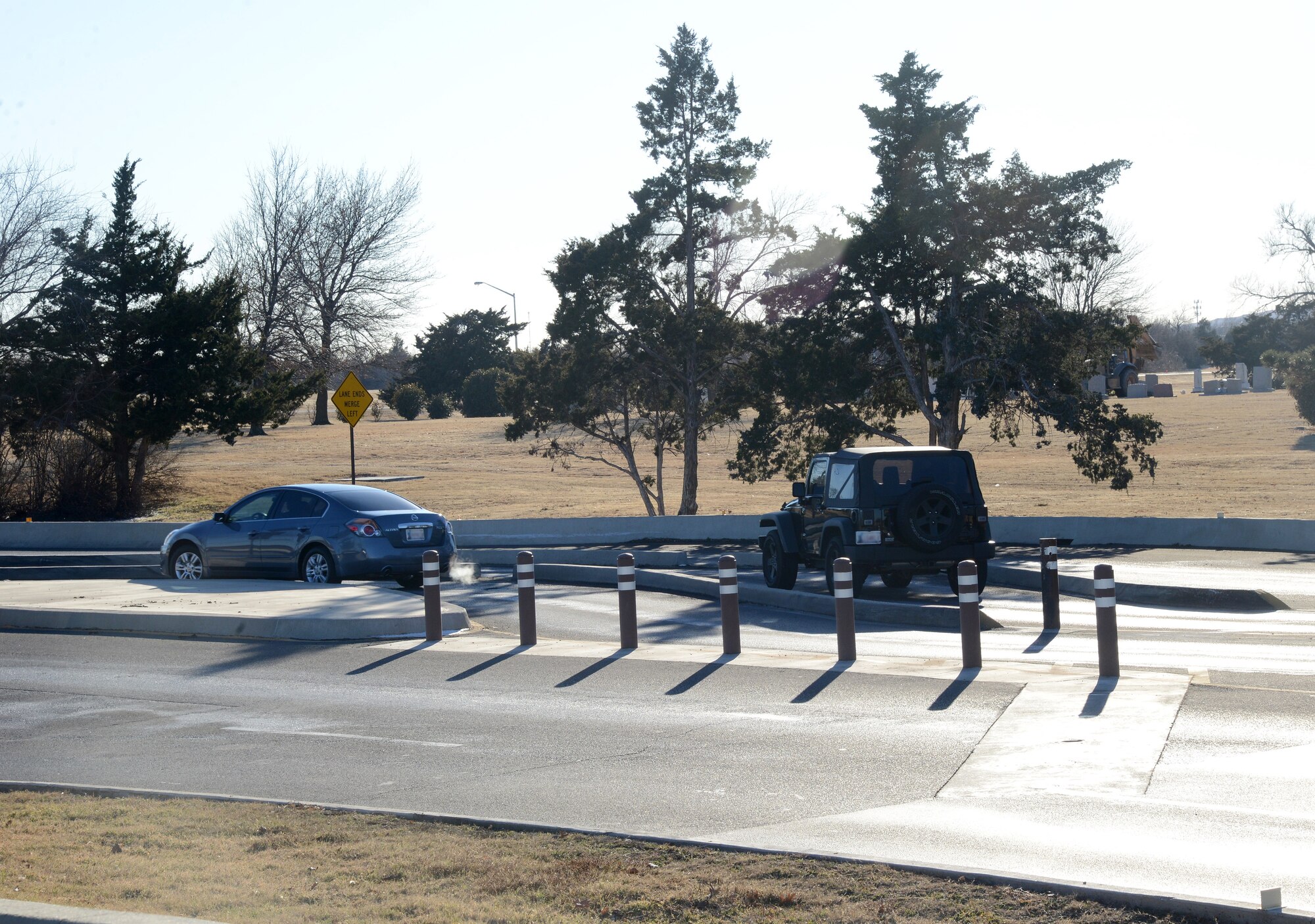 Common sense and safe driving practices should be applied when manuevering through the “S” curves at Tinker Gate. Drivers in the second lane must yield to those in the first lane, and use their blinkers, before moving into the left lanes. (Air Force photo by Kelly White)