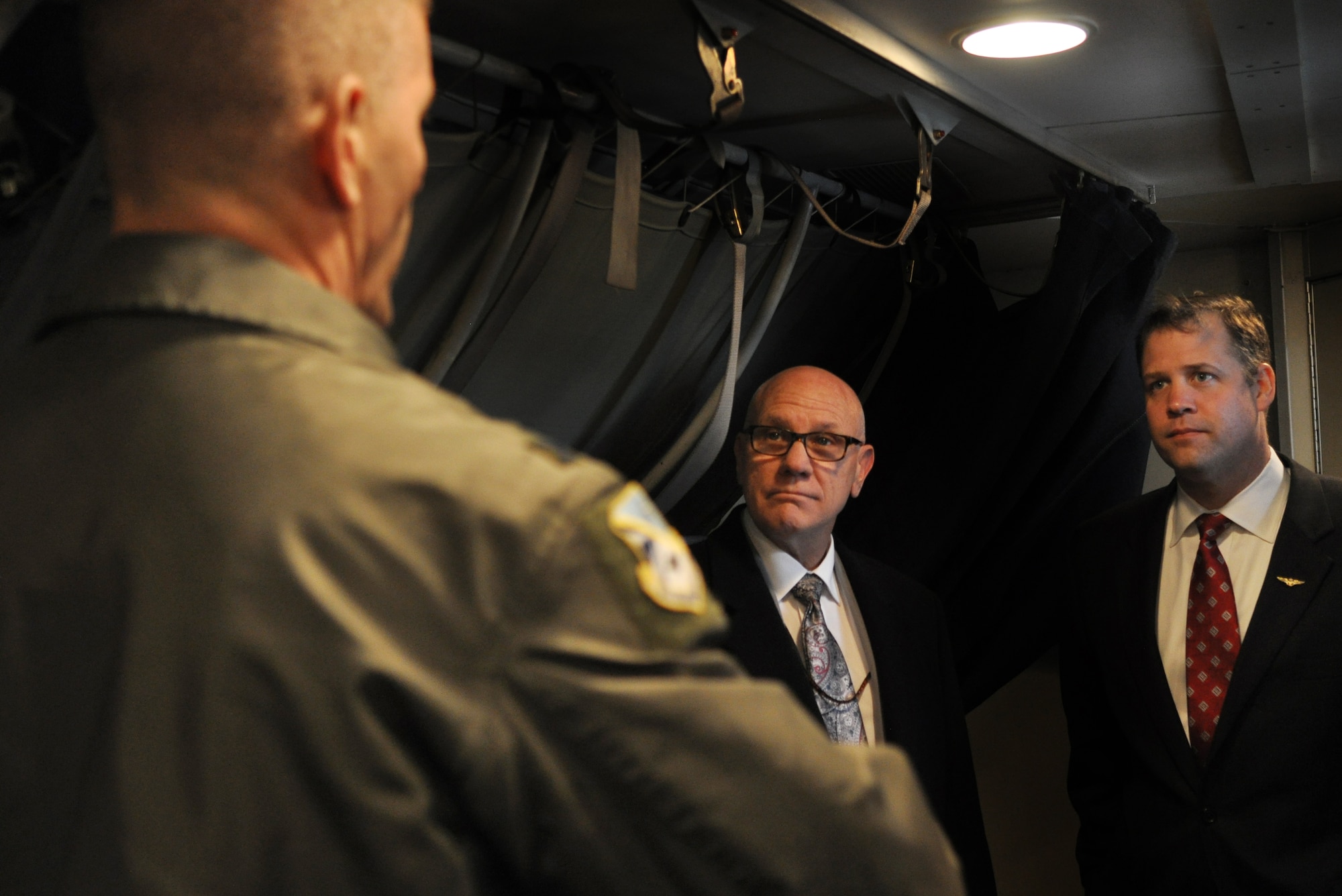 Congressman Jim Bridenstine, right, received a briefing on the Block 40/45 upgrades to the E-3 AWACS from Lt. Col. Tony Kleiger, 965th Airborne Air Control Squadron, left, and Gordon Fitzgerald, 552nd Air Control Wing plans, center. The upgrades are performed by the Oklahoma City Air Logistics Complex at Tinker. The congressman, who represents Oklahoma’s first district in the U.S. House of Representatives, visited Tinker AFB Jan. 23 and received briefings from the Air Force Sustainment Center, the 552nd Air Control Wing, and the Navy’s Strategic Communications Wing ONE. Congressman Bridenstine is a Navy pilot and combat veteran of Iraq and Afghanistan. (Air Force photo by Micah Garbarino)
 