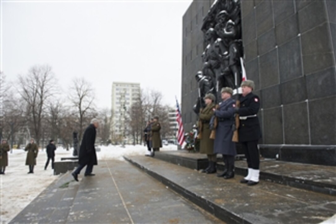 U.S. Defense Secretary Chuck Hagel prepares to lay a wreath at the Warsaw Ghetto in Warsaw, Poland, Jan. 31, 2014. Hagel is on a trip to Europe to meet with defense leaders and attend the 50th Munich Security Conference.