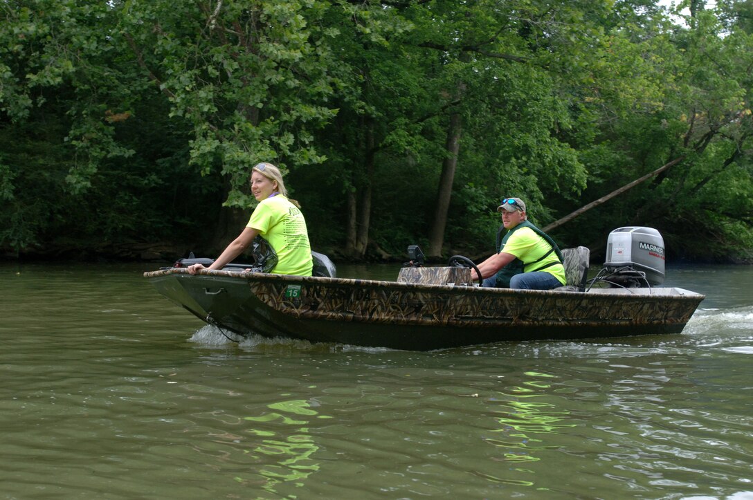 Several volunteers navigate the Duck River in Shelbyville, Tenn., June 28, 2014 while participating in the “Don’t Muck The Duck” cleanup event.  The U.S. Army Corps of Engineers Nashville District had several employees on location to seek input for the Duck River Watershed Assessment.