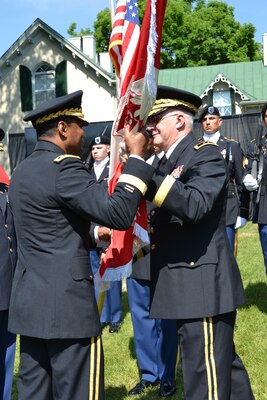 Maj. Gen. Michael Eyre relinquishes command of the U.S. Army Corps of Engineers, Transatlantic Division as he passes the colors to Lt. Gen. Thomas Bostick, U.S. Army Chief of Engineers.