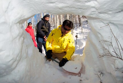 Army National Guard Lt. Col. Joe Laurel, commander of the Hawaii National Guard's 93rd Civil Support Team, digs out snow to form a snow shelter as part of joint-forces training with the Colorado National Guard's 8th Civil Support Team and 5th Battalion, 19th Special Forces Group, in Snowmass Village, Colo., Jan. 25, 2012. The Hawaii Guardsmen are in Colorado in support of CONG operations at the Winter X Games. All Guardsmen were instructed to wear civilian clothes for the duration of their training to reduce military visibility to mitigate civilian concern.