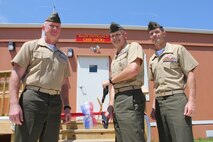 Col. Kurt Brubaker, officer in charge for the Legal Services Support Section-National Capital Region, left, Maj. Gen. Vaugh Ary, staff judge advocate for Gen. James Amos, commandant of the Marine Corps and Col. Christopher Edwards, chief of staff at Marine Corps Base Quantico, participate in a ribbon-cutting ceremony for the LSSS-NCR newly constructed building across from Lejeune Hall on June 20, 2014, aboard Marine Corps Base Quantico. 