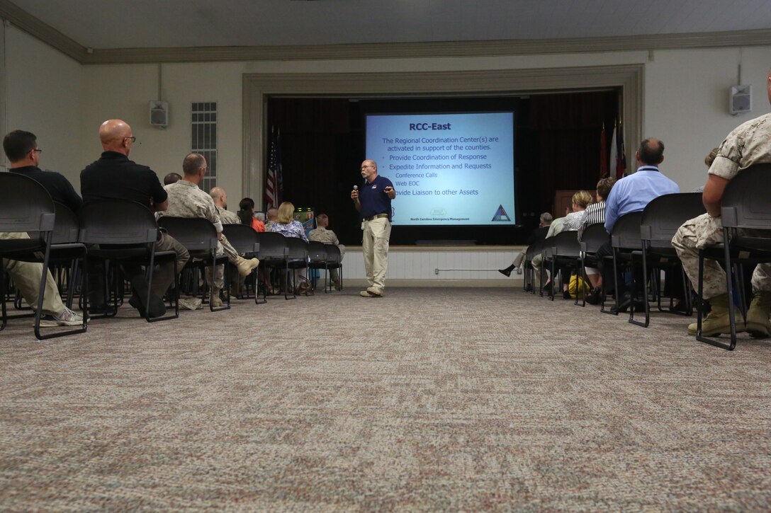 Douglas Haas, a coordinator with the North Carolina Department of Public Safety, spoke to patrons at the 2014 Hurricane Preparedness Town Hall Meeting about the importance of being informed and having a plan for emergencies, aboard Marine Corps Base Camp Lejeune, June 18. Attendees learned valuable information on how to prepare for a destructive weather emergency.