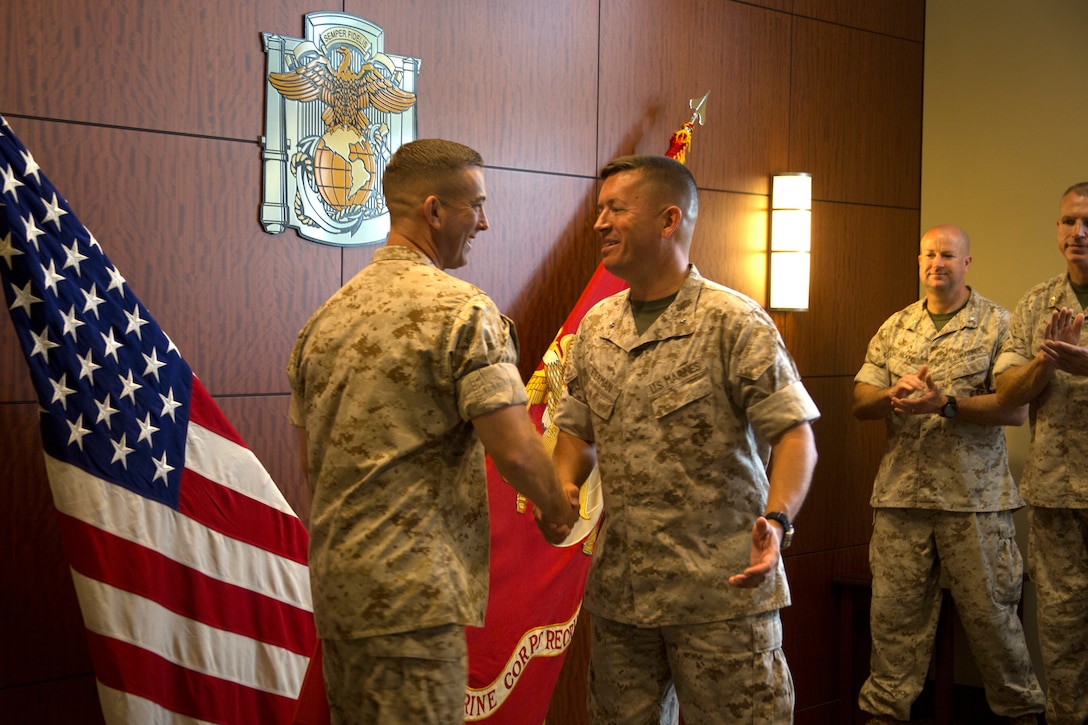 Lt. Col. Lance Langfeldt is promoted to his current rank in the commanding general's conference room aboard Marine Corps Recruit Depot San Diego, July 1. Langfeldt was promoted by Brig. Gen. James Bierman, commanding general of MCRDSD