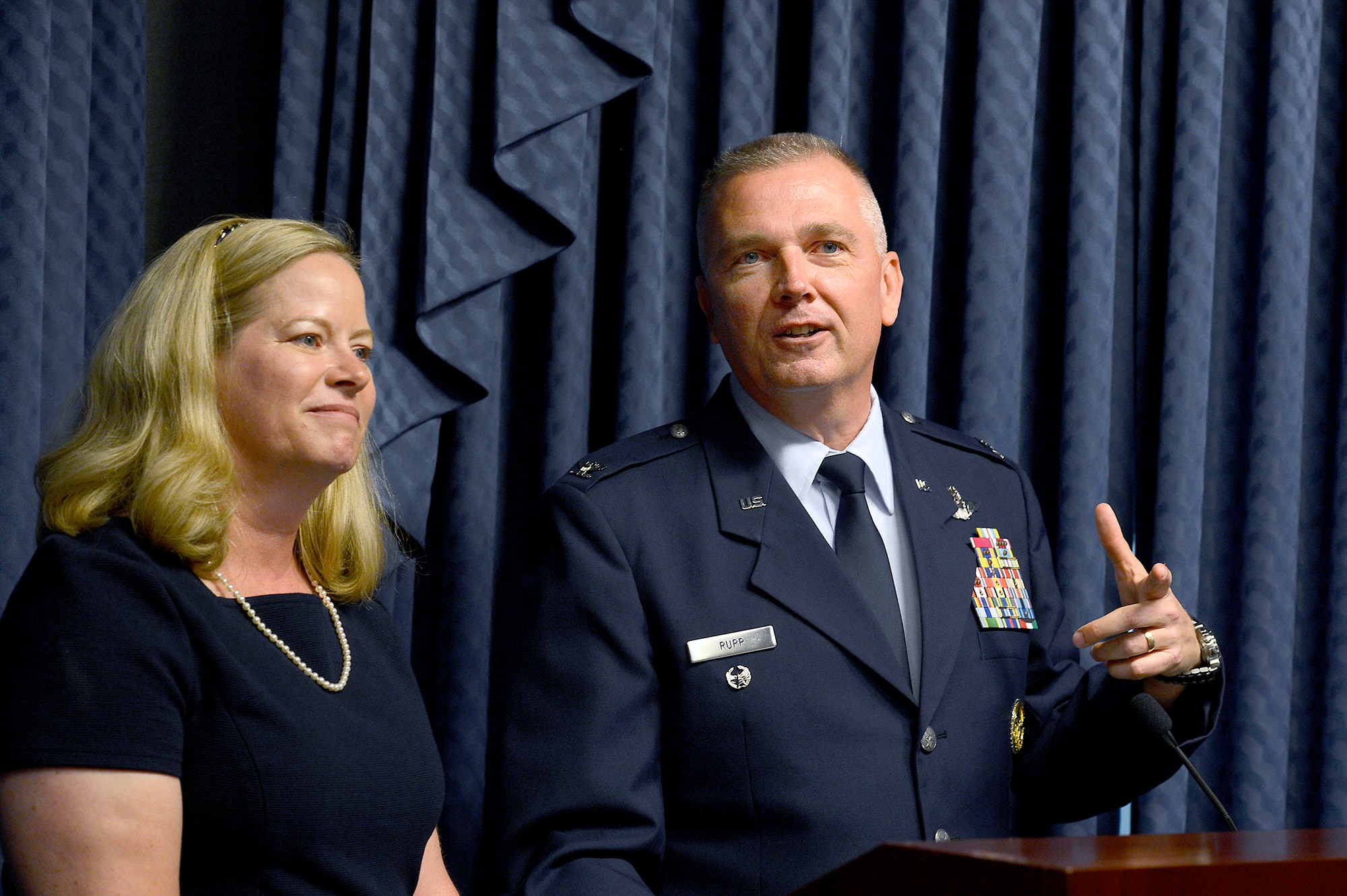 Col. Ricky Rupp, with his wife, Charlotte, speak after receiving the 2013 General and Mrs. Jerome F. O'Malley Award June 27, 2014, during a Pentagon ceremony.  Rupp, the special assistant to the commander at U.S./Republic of Korea Combined Forces Command at U.S. Army Garrison Yongsan.  The award was earned during the Rupps' time while leading the 22nd Air Refueling Wing at McConnell Air Force Base, Kan.  (U.S. Air Force photo/Scott M. Ash)