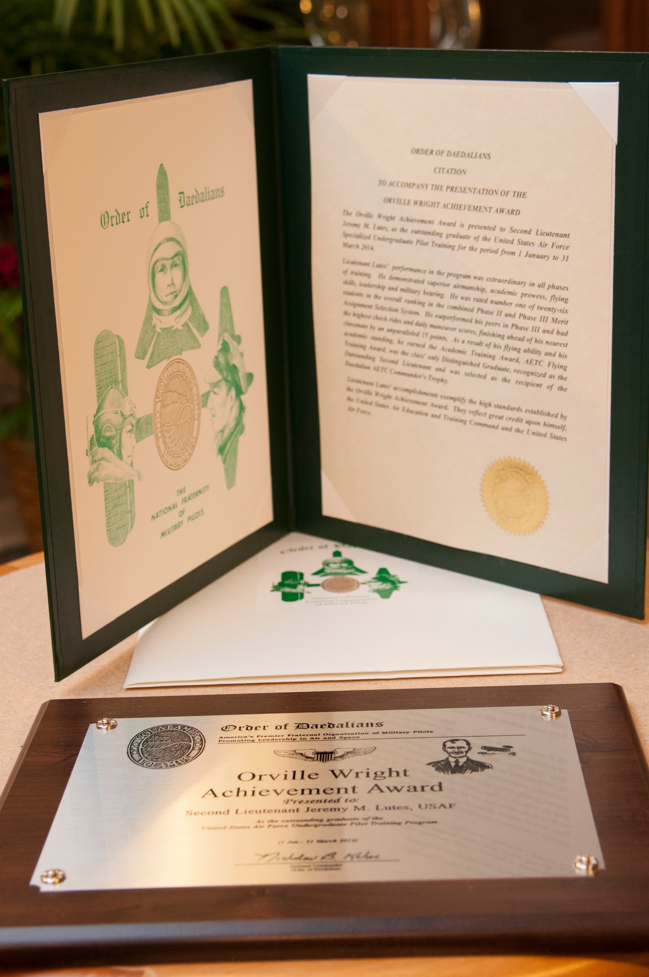 The Order of the Daedalians’ Achievement Award and Citation, rest on a table at Club XL on Laughlin Air Force Base, Texas, June 26, 2014. The Award was presented to 2nd Lt. Jeremy Lutes, a 47th Student Squadron graduate, for being an outstanding Airman, leader and student. (U.S. Air Force photo by Airman 1st Class Jimmie D. Pike)(Released)