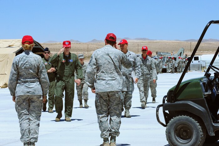 Gen. Mike Hostage, commander of Air Combat Command, arrives to meet with Airmen from the 820th RED HORSE during a visit June 27, 2014, at Nellis Air Force Base, Nev. During the visit, Hostage was briefed on various aspects of the mission. (U.S. Air Force photo by Airman 1st Class Joshua Kleinholz/released)