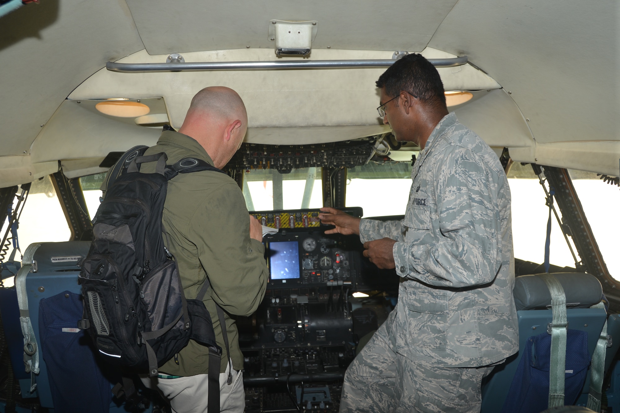 Maj. Anil Hariharan, director of Operations, 346th Test Squadron, Joint Base San Antonio-Lackland, Texas discusses with Daniel Terdiman, a senior writer with C-NET News about the overall importance of securing information while in the cockpit of a C-5A Galaxy aircraft.  All the components (e.g., displays, radios, etc.) are potentially susceptible to emitting EM signals; therefore, new systems or modifications need to undergo emanations testing.