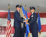 Col. Matthew C. Isler (right) accepts the 12 FTW guidon from Maj. Gen. Michael A. Keltz, Director of Intelligence, Operations and Nuclear integration Headquarters, Air Education and Training Command, Joint Base San Antonio-Randolph, Texas, during the Change of Command Ceremony June 25.  These ceremonies represent the formal passing of responsiblity, authority and accountablility of command from one officer to another. (U.S. Air Force photo by Melissa Peterson.