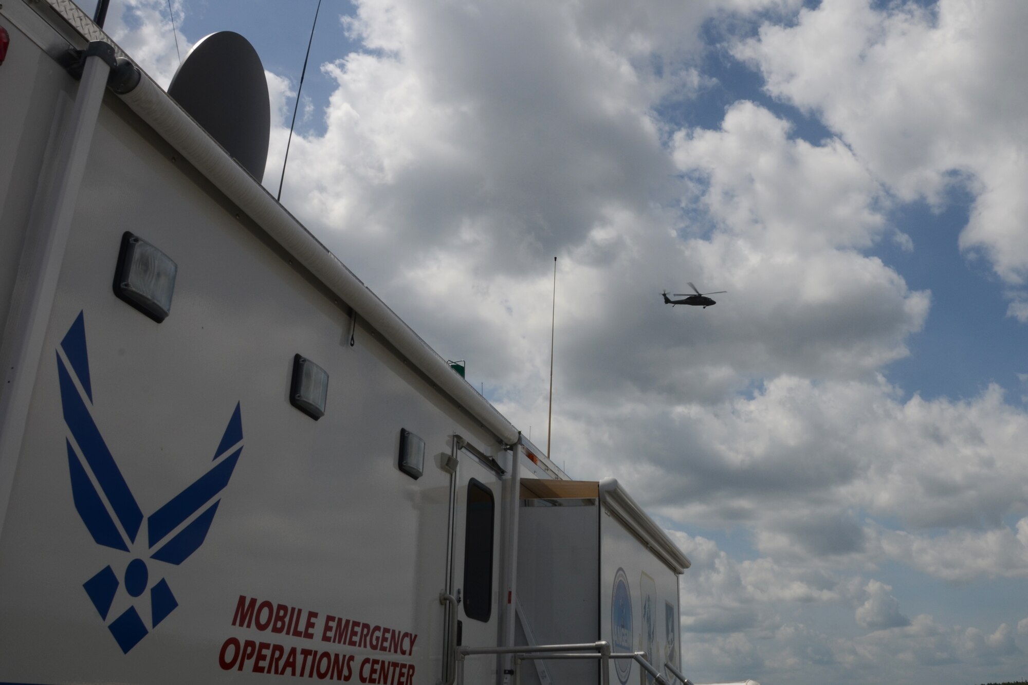 A UH-60 "Blackhawk" helicopter, supporting the South Carolina Helicopter Amphibious Rescue Team (SC-HART) from the South Carolina Army National Guard, leaves the exercise area at the Georgetown County Airport on June 3, 2014 to participate in a hurricane preparedness exercise with local emergency first responders to kick-off the first week of the hurricane season. Soldiers and Airmen from the South Carolina National Guard work side-by-side with the S.C. Emergency Management Division and first responders from local emergency agencies to effectively respond to any hurricane that may threaten the state. The exercise scenario involved a hurricane post-landfall response between federal, state and local agencies, which includes training in communications and first responder skills, with a focus on how to better protect and assist citizens during emergency situations. (U.S. Air National Guard photo by Senior Master Sgt. Edward Snyder/Released)