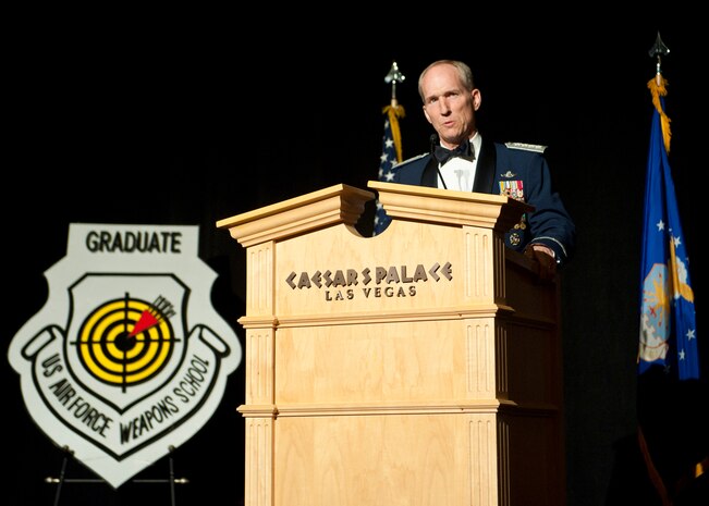 Gen. Mike Hostage, Air Combat Command commander delivers a speech at the U.S. Air Force Weapons School graduation ceremony at Caesar’s Palace, June 28, 2014, Las Vegas, Nev. The graduates were led by a cadre of tactical experts. The students were hand-picked to learn how to win our nation’s wars across air, space, cyber space, advise senior decision makers, and be leaders of Airmen. (U.S. Air Force photo by Airman 1st Class Thomas Spangler) 