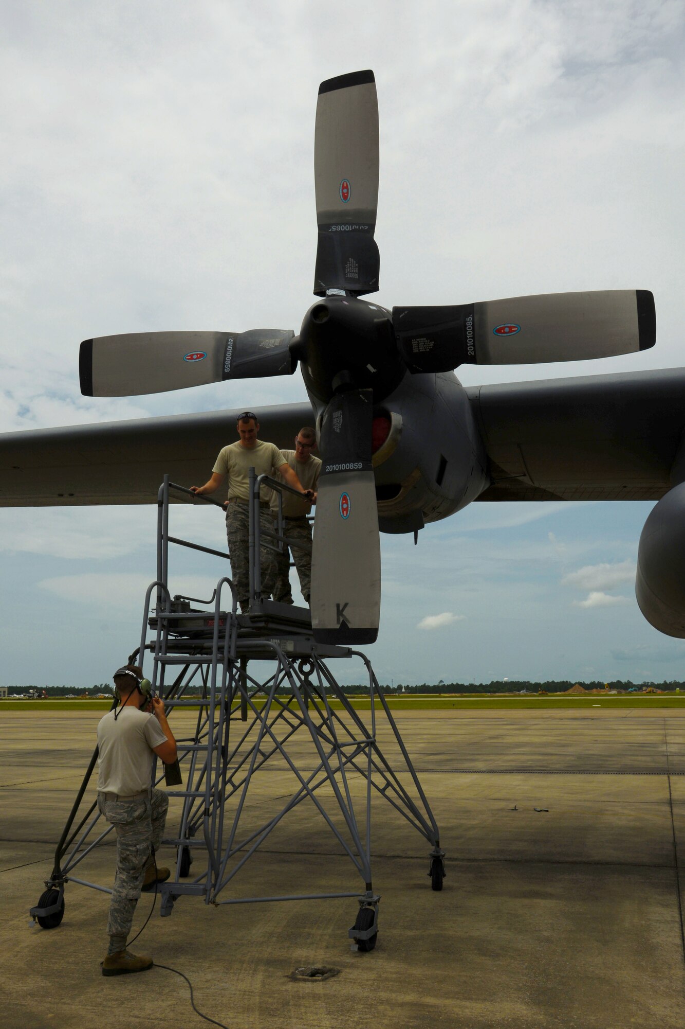 Senior Airman Nick Dill (foreground), Senior Airman Collin Nelson (middle), and Senior Airman Zack Sabluk (rear), of the 103rd Maintenance Squadron, prepare to inspect an access panel on a C-130H prop as part of a scheduled aircraft inspection.  Aircraft maintainers with the Connecticut Air National Guard are training alongside their counterparts from the Kentucky Air National Guard while deployed to the Combat Readiness Training Center, Gulfport, Miss., June 25, 2014.  (U.S. Air National Guard photo by Senior Airman Jennifer Pierce)