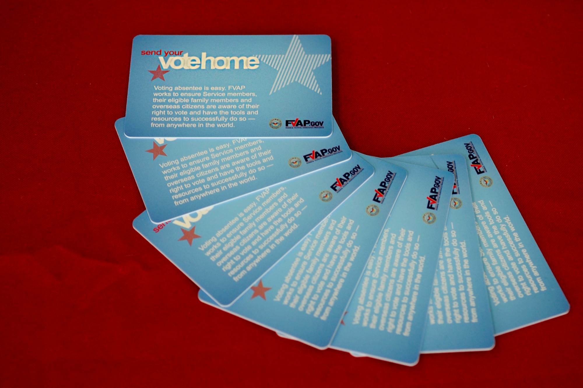 Information cards are displayed during Armed Forces Voter’s Assistance Week information booth, inside the Base Exchange, June 30, 2014, at Mountain Home Air Force Base, Idaho. Useful tools and resources, as well as directions on how to submit an absentee ballot will be given by Voter Assistance officers throughout the week. (U.S. Air Force photo by Senior Airman Caitlin Guinazu/Released)

