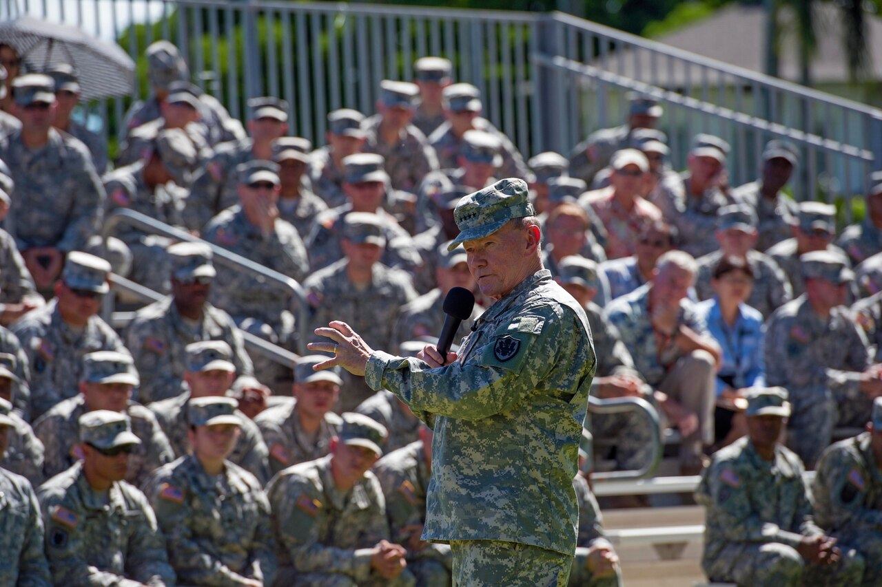 Army Gen. Martin E. Dempsey, chairman of the Joint Chiefs of Staff, speaks with service members during a town hall on Fort Shafter, Hawaii, June 30, 2014. Dempsey told U.S. Army Pacific soldiers that he hopes the military services can retain their own unique field uniforms, adding that having separate military services brings perspectives to the table that are the epitome of “jointness.” DoD photo by U.S. Navy Petty Officer 1st Class Daniel Hinton