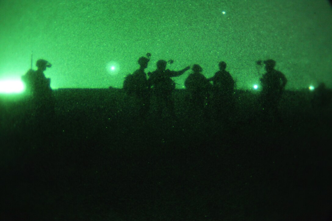 U.S. soldiers provide security during an air assault mission near Bagram Airfield in Afghanistan's Parwan province, June 21, 2014.