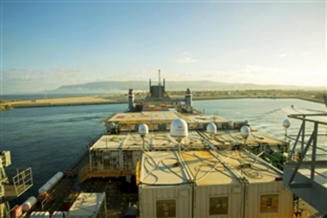 The container ship M/V Cape Ray enters the Medcenter Container Terminal in Gioia Tauro, Italy, July 1, 2014, where the crew will receive Syrian chemical materials from a Danish cargo ship. Cape Ray is tasked with the neutralization of specific chemical materials from Syria in accordance with the Organization for the Prohibition of Chemical Weapons guidelines while operating in international waters.