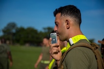 A Marine with Supply Company, 2nd Supply Battalion, 2nd Marine Logistics Group blows into a blood alcohol content calculator during a unit alcohol awareness and physical training session aboard Camp Lejeune, N.C., June 30, 2014. The unit’s command selected 12 Marines with different body types to demonstrate the effect alcohol has on the physical abilities and coordination of different people.