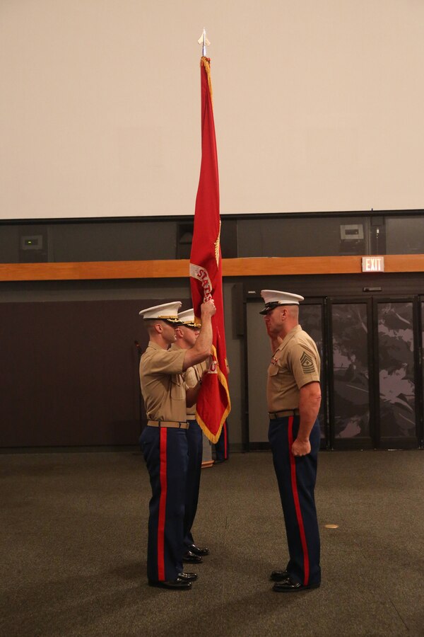 U.S. Marine Corps Maj. Scott E. Stephan, (left), prepares to pass the flag of Marine Corps Recruiting Station Louisville signifying the change of command to Maj. Donald L. Hotchkiss at the Kentucky Derby Museum at Churchill Downs June 26, 2014. Stephan served as the RS Louisville Commanding Officer since June 2011 and has overseen the contracting of 1,971 Marines. Hotchkiss comes to RS Louisville from Combat Logistics Battalion 4 in Okinawa, Japan where he served as the company commander of Motor Transport Company A and the battalion operations officer. (U.S. Marine Corps photo by Cpl. Tyler Birky/Released)