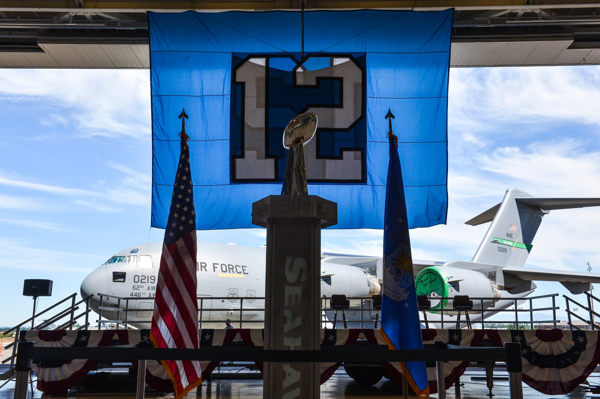 The Vince Lombardi Trophy sits upon a trophy case July 1, 2014, just before fans are let in to Hangar 9 during the 2014 Seattle Seahawks 12 Tour at Joint Base Lewis-McChord, Wash. The trophy was awarded to the Seahawks after winning Super Bowl XLVIII earlier this year. (U.S. Air Force photo/Staff Sgt. Russ Jackson)