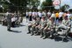 Col. Bill Knight, 11th Wing/Joint Base Andrews commander, speaks to Airmen, Sailors and base leadership gathered for a ribbon cutting ceremony officially opening the new volleyball and basketball courts built for dorm residents at Joint Base Andrews, Md., June 26, 2014. (U.S. Air Force photo/Airman 1st Class Joshua R. M. Dewberry)