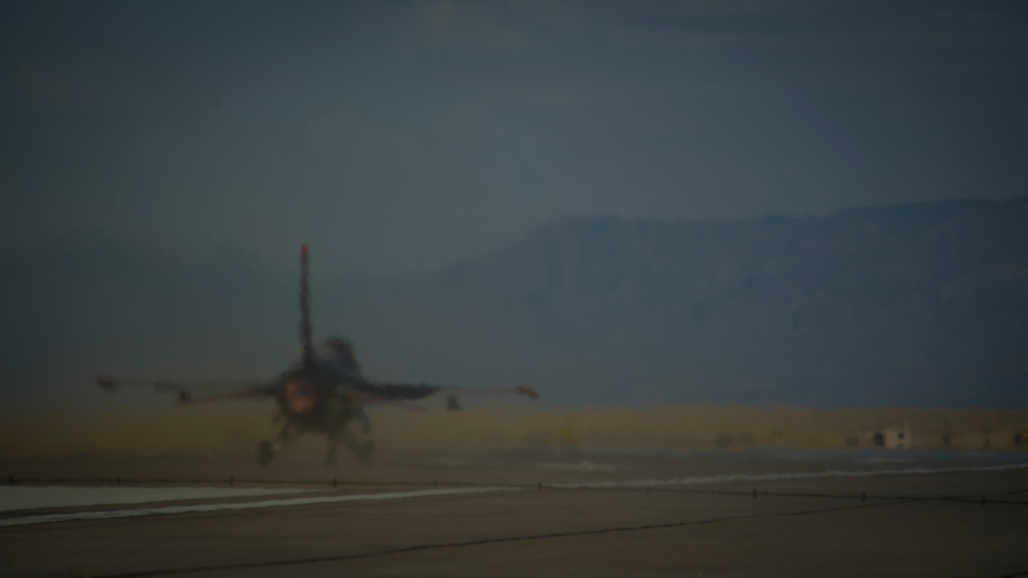 A QF-16 takes off during an unmanned live fire exercise at Holloman Air Force Base, N.M., June 25. A QF-16 took part in an operational live fire exercise as part of the aircrafts test flight program before the beginning of production at the Boeing facility in Cecil Field, Jacksonville, Fla. in late 2014. (U.S. Air Force photo by Airman 1st Class Aaron Montoya / Released)