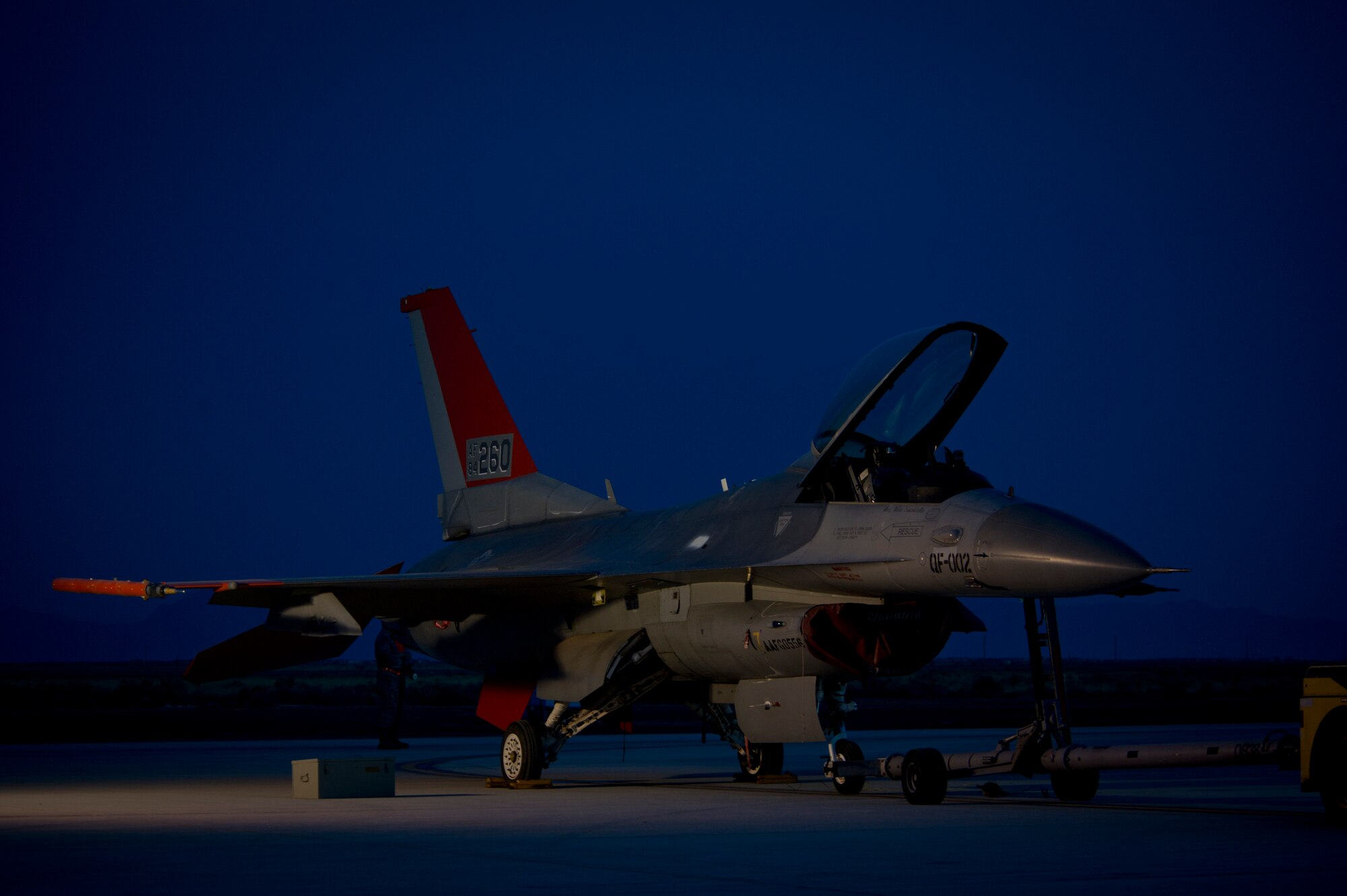 A QF-16 awaits a pre-flight inspection for an unmanned live fire exercise at Holloman Air Force Base, N.M., June 25. A QF-16 took part in an operational live fire exercise as part of the aircrafts test flight program before the beginning of production at the Boeing facility in Cecil Field, Jacksonville, Fla. in late 2014. (U.S. Air Force photo by Airman 1st Class Aaron Montoya / Released)