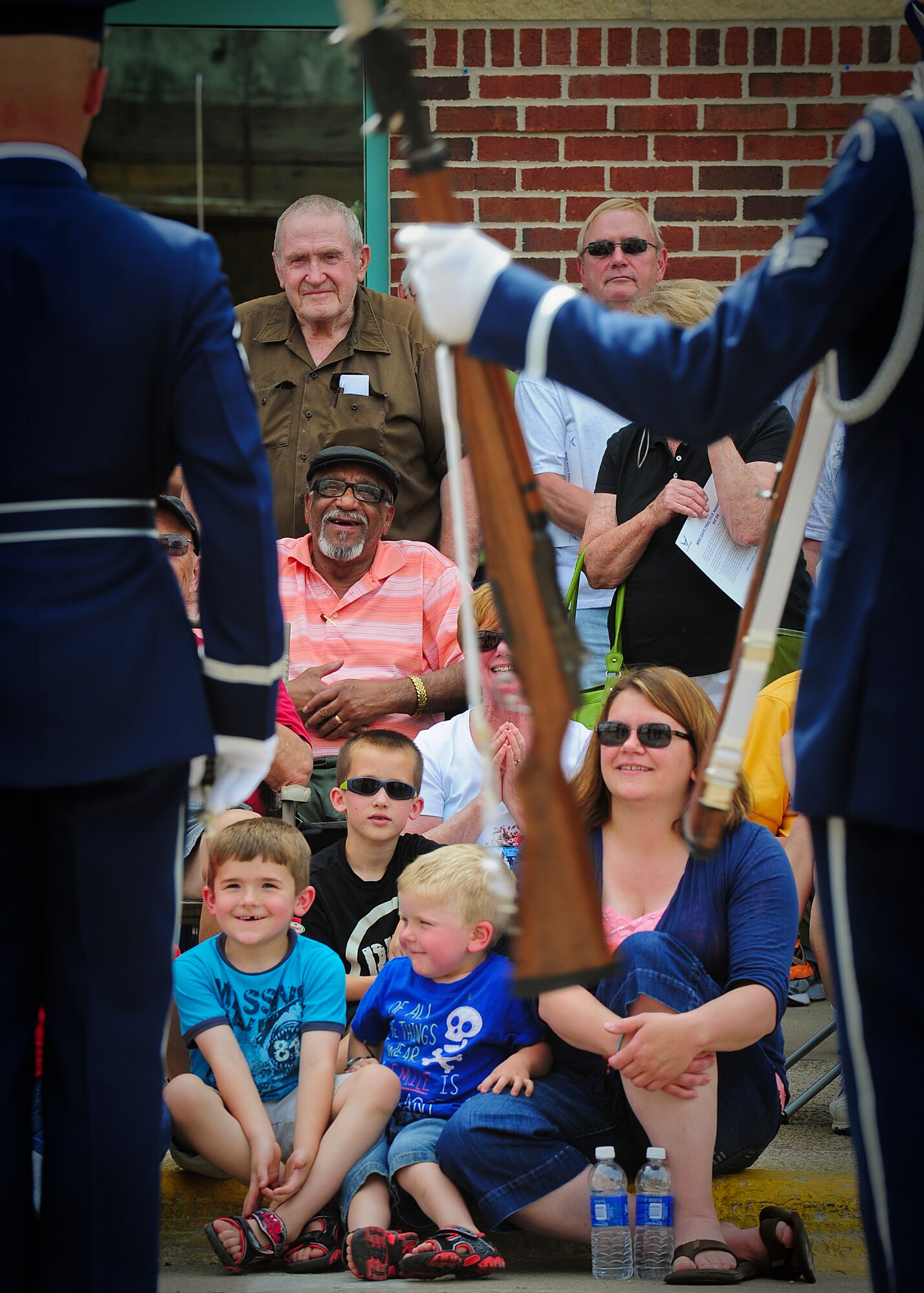 Residents of Austin, Minnesota watch the U.S. Air Force Honor Guard Drill Team June 24, 2014. The Drill Team recently completed a nine-day, seven-city, 10-performance tour across the Midwest with the U.S. Air Force Band’s rock ensemble Max Impact. During the tour, the two groups performed in Wisconsin, Minnesota, South Dakota, Wyoming and Nebraska. (U.S. Air Force Photo by 1st Lt. Nathan Wallin)