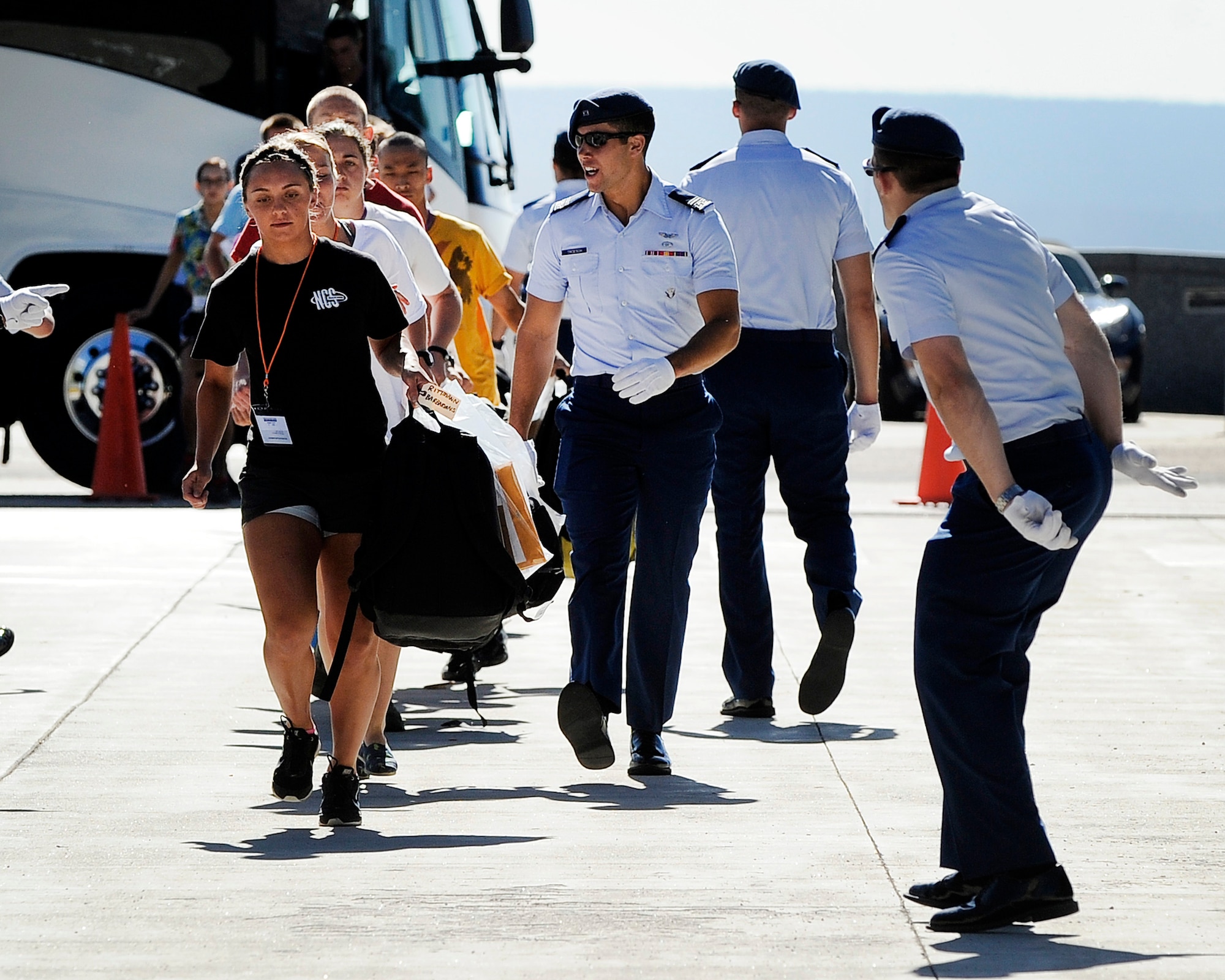 Cadet cadre bark at basic cadets during basic cadet inprocessing here June 26. Hundreds of cadet cadre will be with the basic cadets throughout all of Basic Cadet Training for training and motivation. (U.S. Air Force photo/Sarah Chambers)