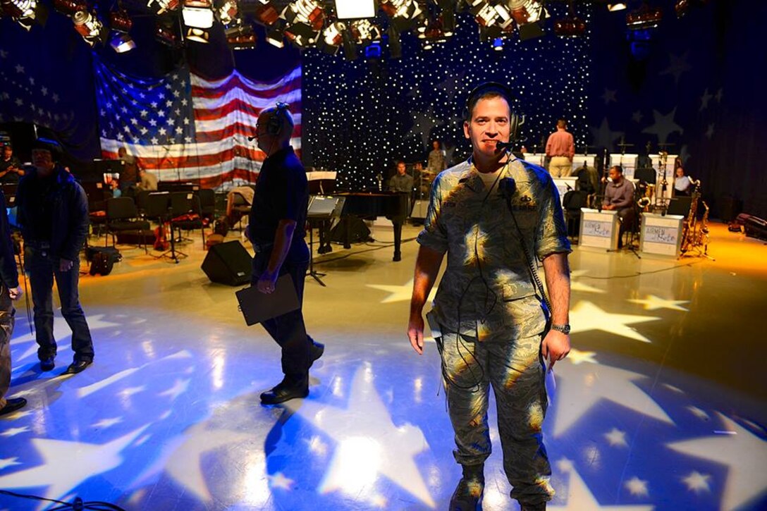 Chief Master Sgt. Jebodiah on the set of "America's Veterans - A Musical
Tribute." He is just one of the support shop members who work behind the
scenes at the Band. (U.S. Air Force photo by Senior Master Sgt. Kevin
Burns/released)