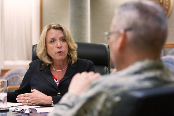 Secretary of the Air Force Deborah Lee James talks with Maj. Gen. Jack Weinstein, 20th Air Force during a visit to F.E. Warren Air Force Base, Wyo., June 30. James met with leadership and Airmen emphasizing the importance of the ICBM force and to check on changes made through the Force Improvement Program. (U.S. Air Force photo by R.J. Oriez) 