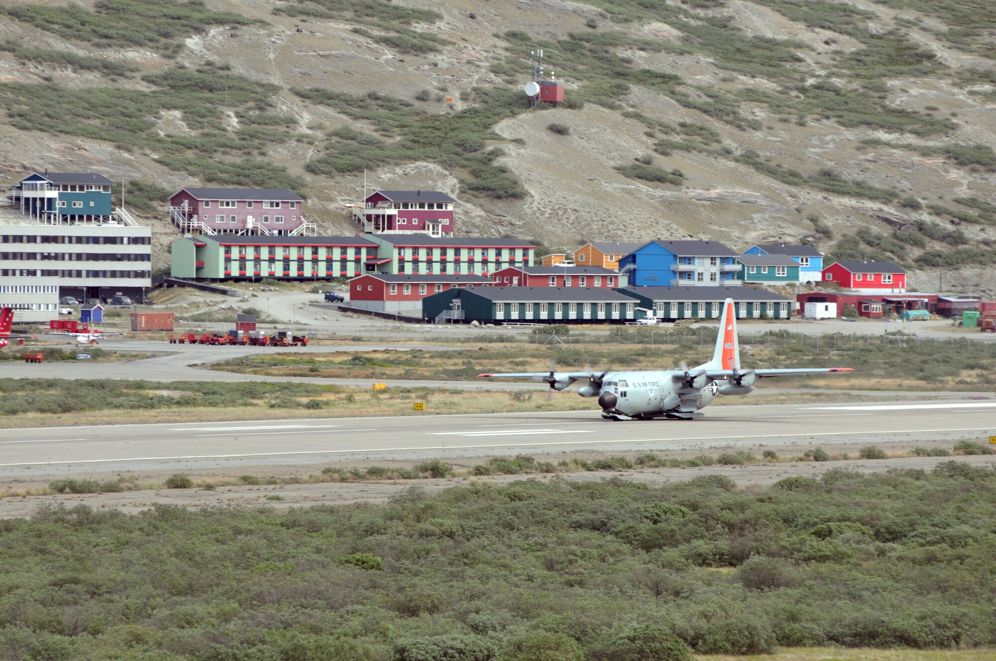 An LC-130 "Skibird" with the 109th Airlift Wing from Stratton Air National Guard Base, Scotia, N.Y., takes off from Kangerlussuaq, Greenland, on June 29, 2014, for Summit Camp. Two LC-130s and 70 Airmen from the Wing recently completed the fourth rotation of the 2014 Greenland season. The unit flies supply and refueling missions to various camps in support of the National Science Foundation and also trains for the Operation Deep Freeze mission in Antarctica. (U.S. Air National Guard photo by Staff Sgt. Benjamin German)