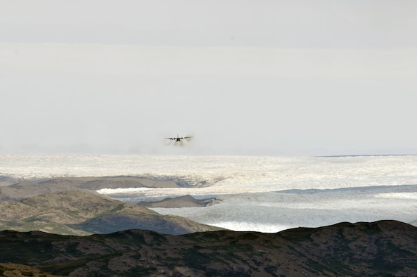 An LC-130 "Skibird" with the 109th Airlift Wing from Stratton Air National Guard Base, Scotia, N.Y., returns to Kangerlussuaq, Greenland, on June 29, 2014, from a mission at Summit Camp. Two LC-130s and 70 Airmen from the Wing recently completed the fourth rotation of the 2014 Greenland season. The unit flies supply and refueling missions to various camps in support of the National Science Foundation and also trains for the Operation Deep Freeze mission in Antarctica. (U.S. Air National Guard photo by Staff Sgt. Benjamin German)