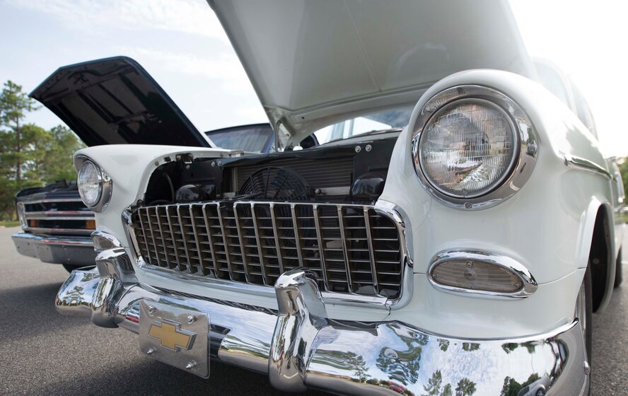 U.S. Air Force Master Sgt. John Lamp, 23d Component Maintenance Squadron first sergeant, won best in show for his 1951 Chevrolet Bel Air at a car show during the Moody Field Club’s barbecue cook-off June 27, 2014, at Moody Air Force Base. The car show was part of Moody’s first barbecue cook-off competition. (U.S. Air Force photo by Airman Dillian Bamman/Released)