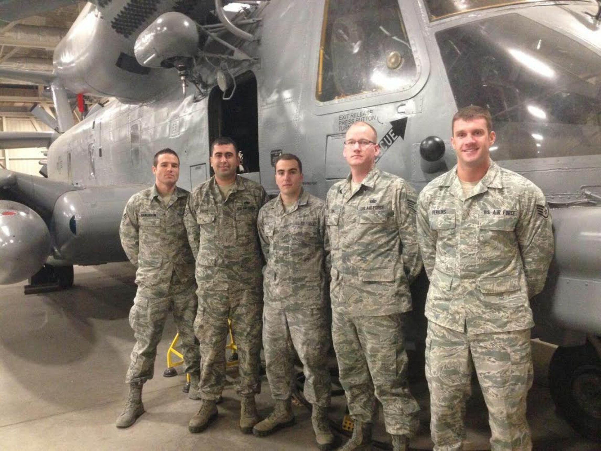 Staff Sgt. Matthew Tidball, (Second from right) 509th Logistics Readiness Squadron fuels hydrants supervisor, poses with members of his three level course in front of a MH-53 Pave Low helicopter at Lackland Air Force Base, Texas. The three level course was one of five courses Tidball has to complete for training. (Courtesy Photo)