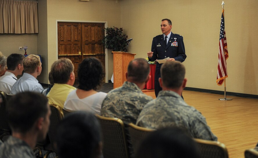 U.S. Air Force Col. Paul Gardetto, former 23d Medical Group commander, thanks family, friends and Team Moody for attending his retirement ceremony at Moody Air Force Base, Ga., June 30, 2014. Gardetto served 2 years in the U.S. Army before transitioning to the U.S. Air Force where he served 27 years retiring with a total of 29 years of service. (U.S. Air Force photo by Airman 1st Class Alexis Millican/Released)
