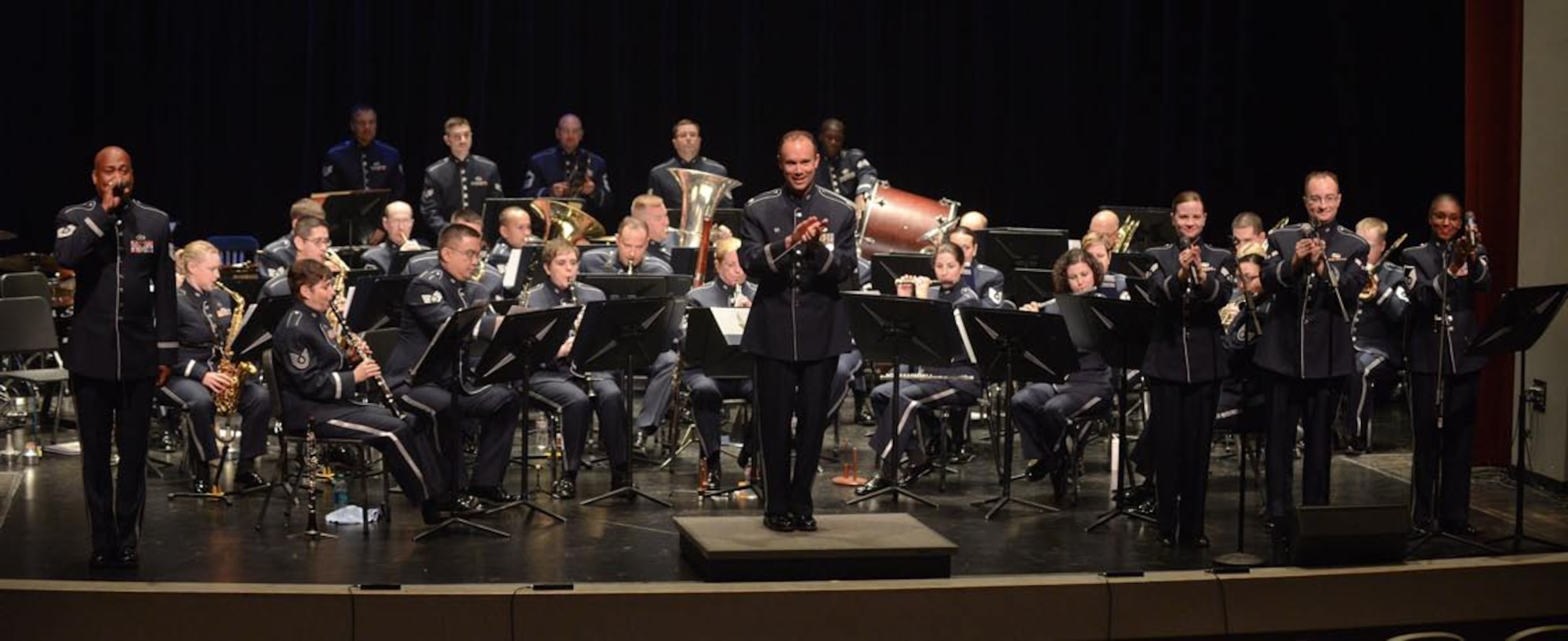 U.S. Air Force Lt. Col. Eric Patterson, 531st Band commander, Air National Guard, conducts the 531st Air Force Band, Band of the Southwest at Bossier Parish Community College, Bossier City, Louisiana, during their local community venues, June 25, 2014. The band's summer tour includes nine venues spread out between locations in Arkansas and Louisiana. (Air National Guard photo by Master Sgt. Charles Hatton/Released)