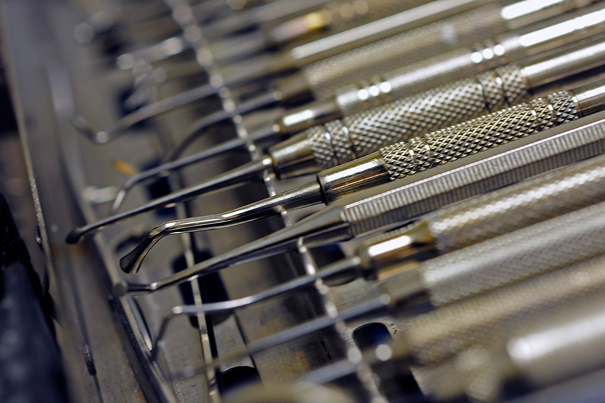 Dental tools are laid out before a clinic appointment, June 19, 2014, at Aviano Air Base, Italy. The 31st Dental Squadron keeps Airmen healthy through a proactive approach that includes annual checkups, dental cleanings, educating patients on healthy habits and techniques for daily care and preventative restorations. (U.S. Air Force photo/Airman 1st Class Ryan Conroy)