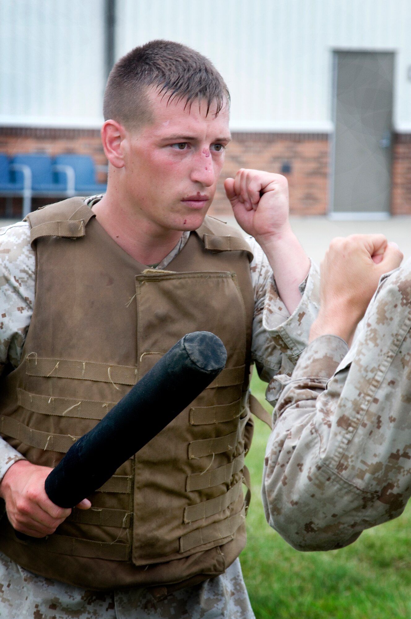 U.S. Marine Corps Sgt. Michael Zaharias, a martial arts instructor trainee from Detachment 1, Communication Company, Combat Logistics Regiment 45, 4th Marine Logistics Group, stands ready to defend himself during a class held at Grissom Air Reserve Base, Ind., June 20, 2014. Grissom Marines went through 13 vigorous days of training to become martial arts instructors. (U.S. Air Force photo/Tech. Sgt. Douglas Hays)