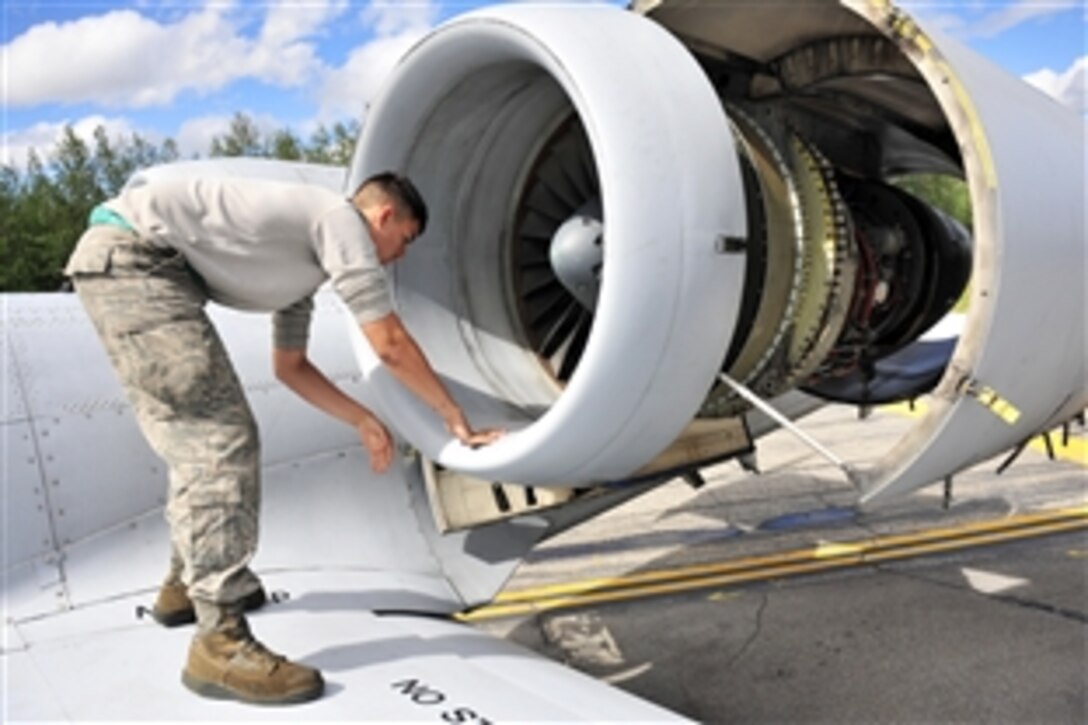 Air Force Airman 1st Class Vincent Hale checks for any cracks on an A-10 Thunderbolt II during Red Flag-Alaska 14-2 on Joint Pacific Alaska Range Complex, Alaska, June 20, 2014. Hale, an aircraft maintainer, is assigned to the 51st Aircraft Maintenance Squadron on Osan Air Base, South Korea.