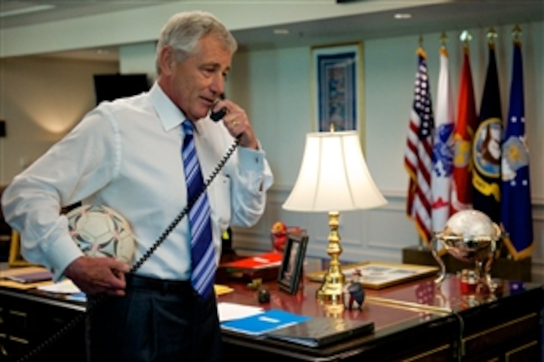 Defense Secretary Chuck Hagel calls Tim Howard, the U.S. Men's National soccer team goalkeeper, from the Pentagon July 2, 2014, to thank the athlete for defending the United States at the World Cup. Social media was abuzz after Howard's Wikipedia page was altered briefly to name him "Secretary of Defense of the United States of America" for his record-breaking number of saves in the July 1, 2014, U.S. match against Belgium. 