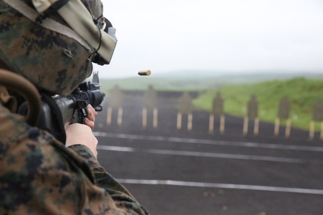 Cpl. Taylor B. Wilson, a Jenks, Oklahoma, native, fires an M16A4 service rifle June 11 during advanced live-fire training, also called Table 3, at Combined Arms Training Center Camp Fuji as part of Exercise Fuji Warrior. Marines and sailors executed advanced M16 and M4 carbine familiarization training. Wilson is a guard with Combat Logistics Regiment 37, 3rd Marine Logistics Group, III Marine Expeditionary Force. 